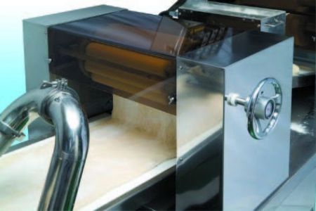 Automatic Layer & Stuffed Paratha Production Line - Place dough into the hopper. Special designed reverses rollers to sheet dough into a thin dough belt.It does not need a dough sheeter, so it saves time, space and does not destroy the texture of dough.